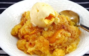 Featured image for Easy Slow Cooker Peach Dump Cake