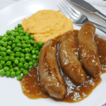 Featured image for Slow Cooker Sausages in Onion Gravy