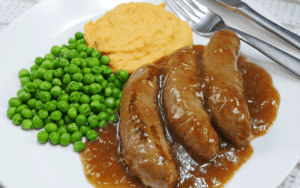 Featured image for Slow Cooker Sausages in Onion Gravy