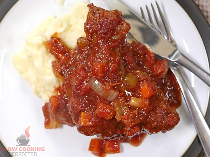 Lamb Shanks cooked in a slow cooker with mashed potato