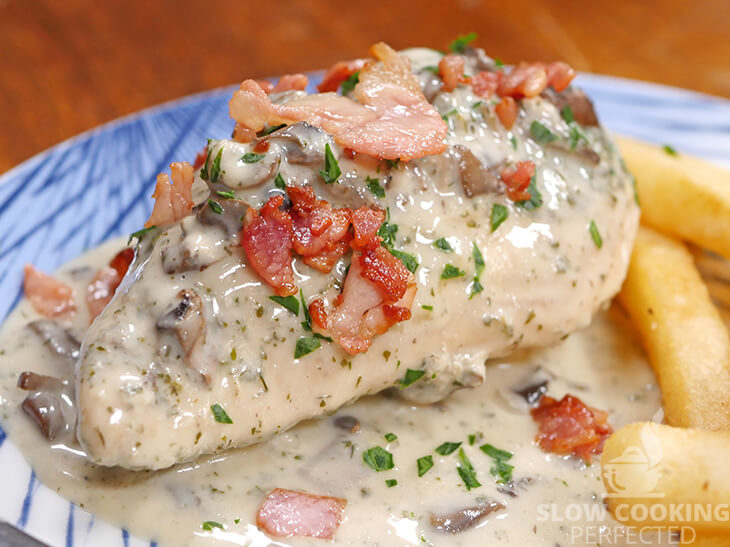 Slow Cooker Ranch Chicken with a Creamy Sauce and topped with Bacon