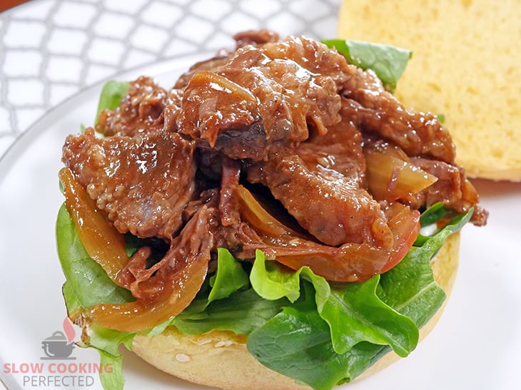 Pulled BBQ beef on a bun with Lettuce